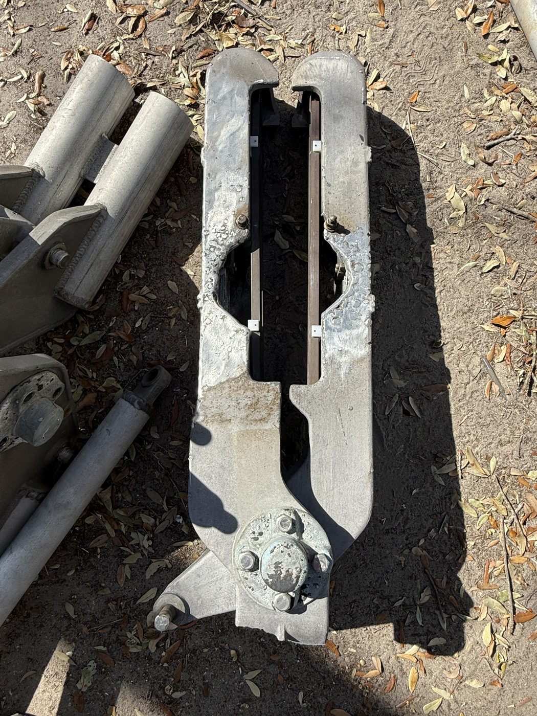 Duke Energy 500 kV pantograph disconnect switch on arrival at Southern Switch — visible arc and lightning damage to the aluminum blade assembly.